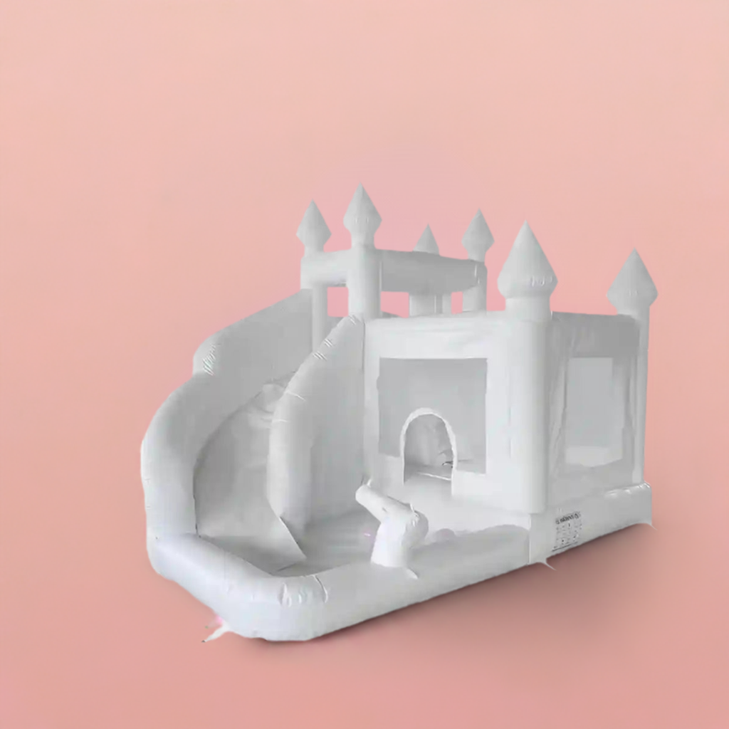 bounce house with water slide with a pink backdrop