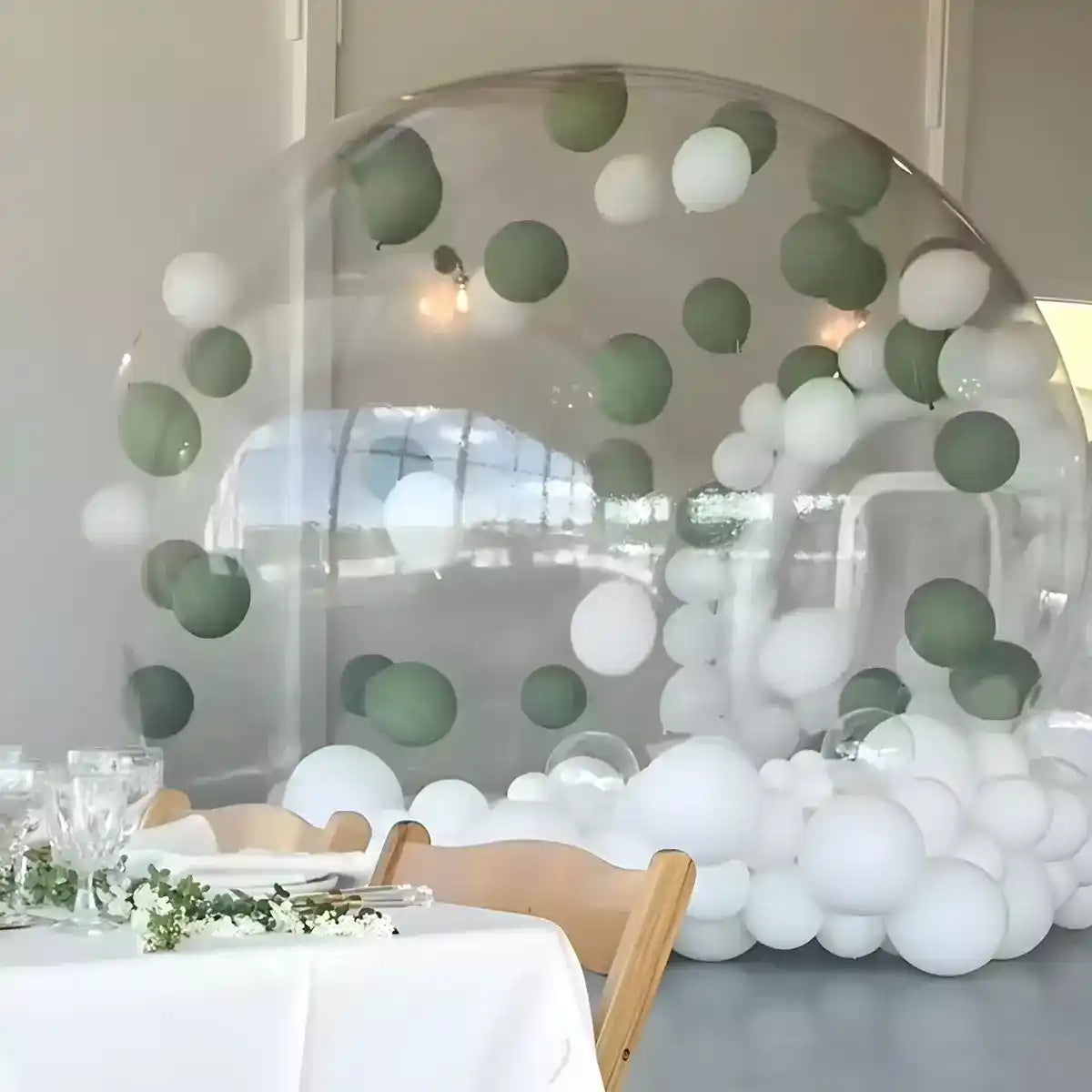 Bubble House decorated with sophisticated green and white balloons for wedding events