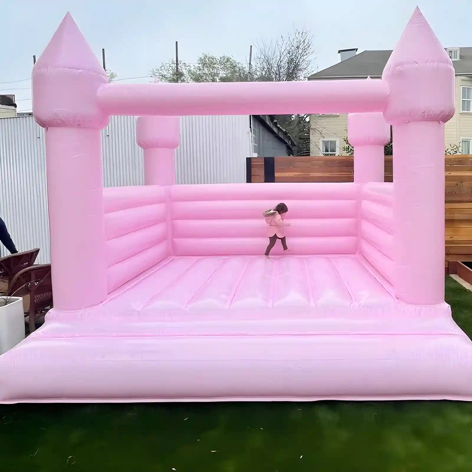 outdoor bounce house in beautiful pink color for perfect kids event