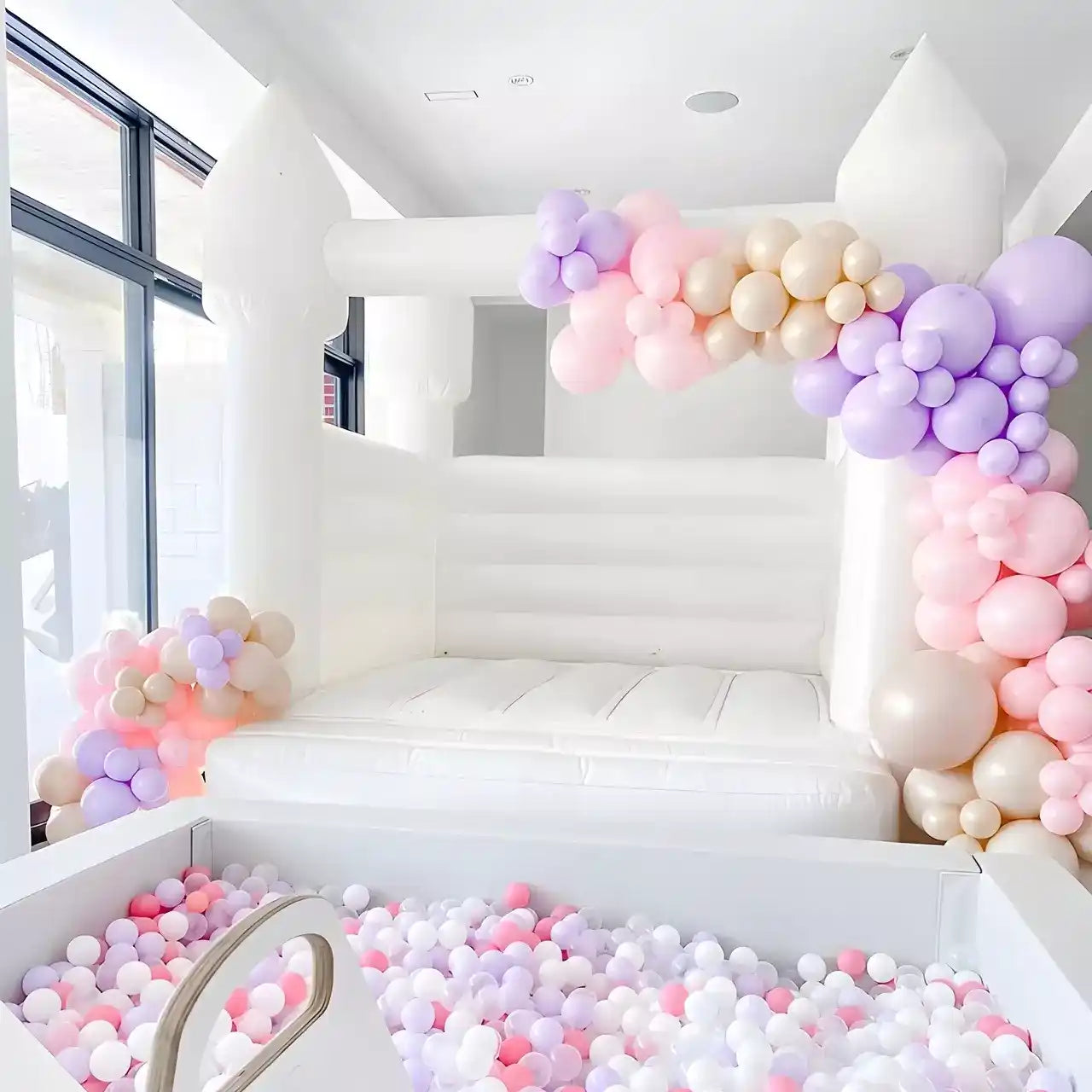 10ft x 10ft white bounce house with ball pits and balloons in soft play business