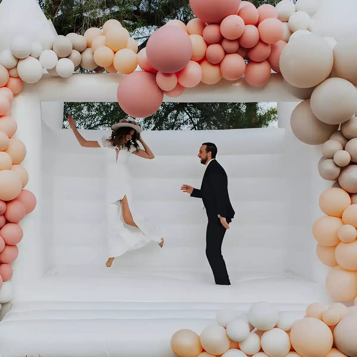 The perfect white jump house for wedding photoshoot