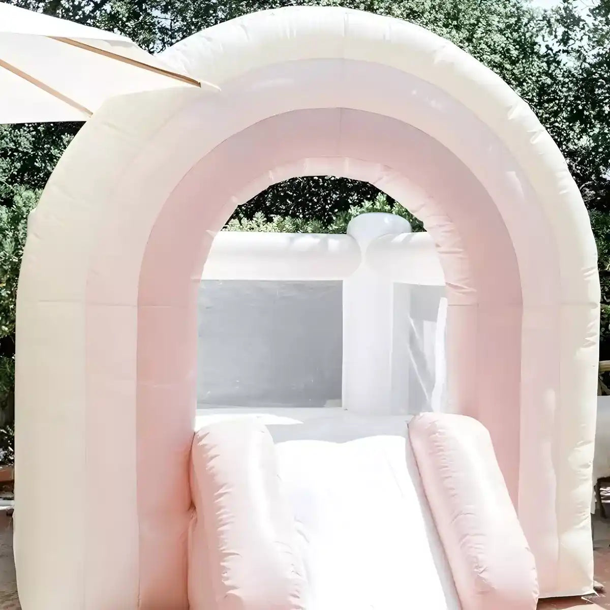 Close shot of a pastel pink bounce house