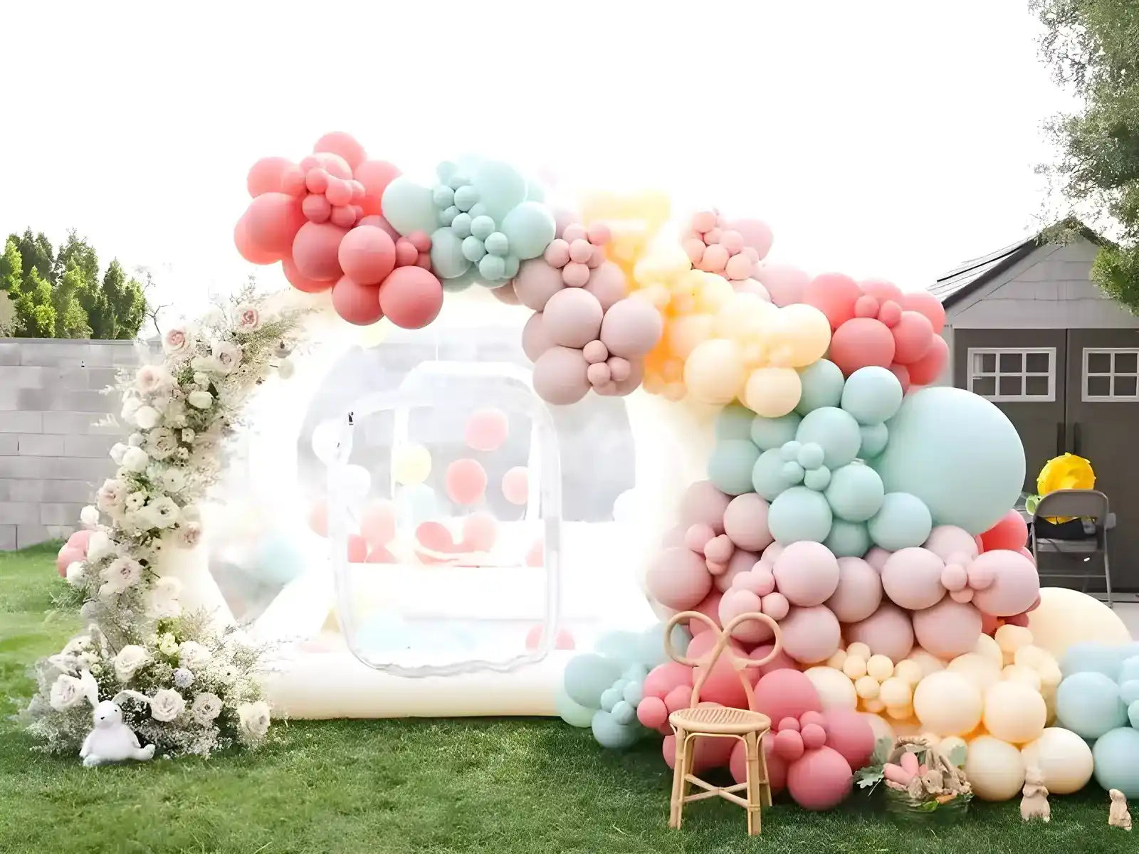 The Bubble House, transparent inflatable bubble tent, decorated with beautiful balloons in the backyard